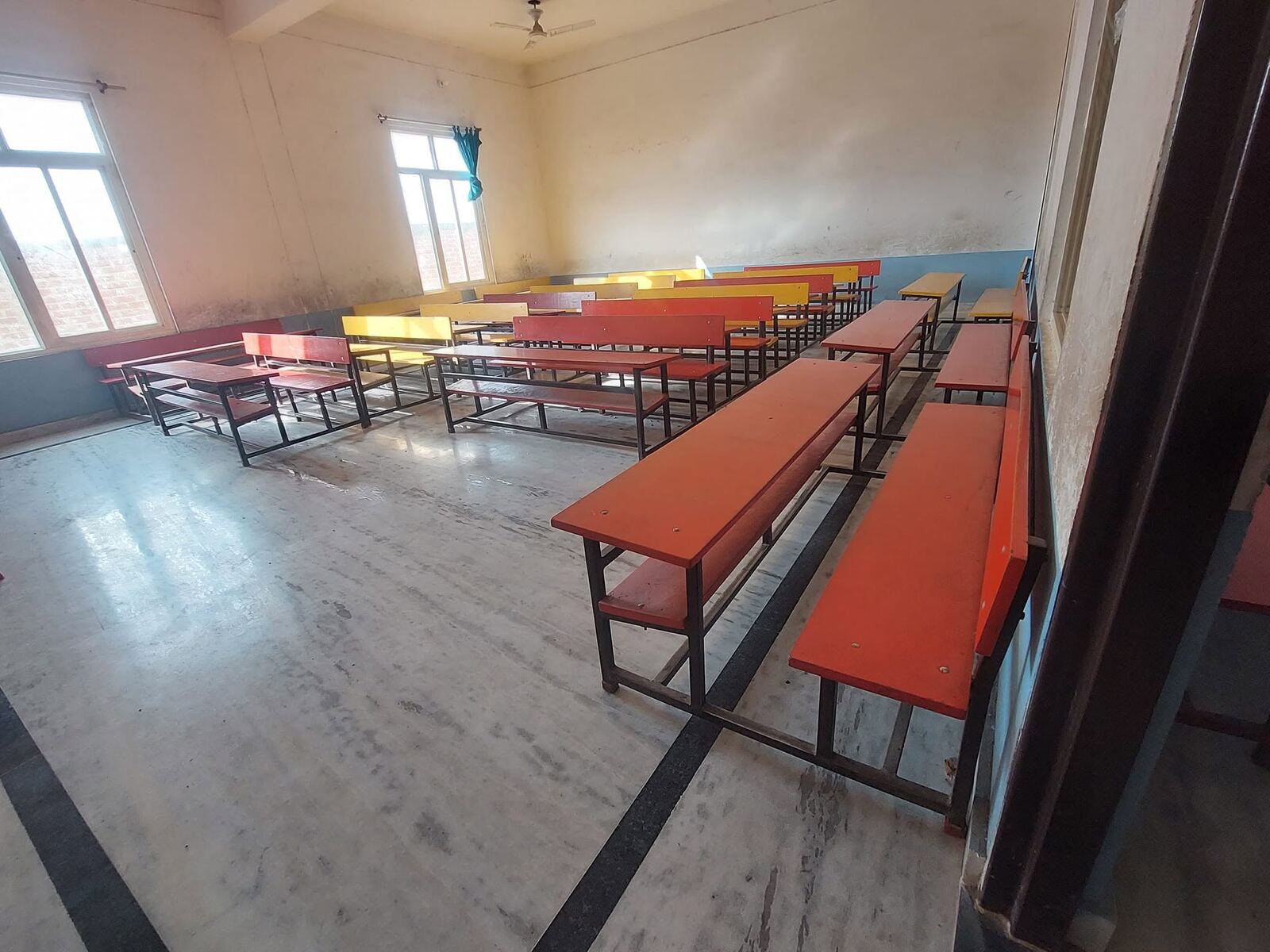 Classroom with benches at B.P. Singh Memorial Academy